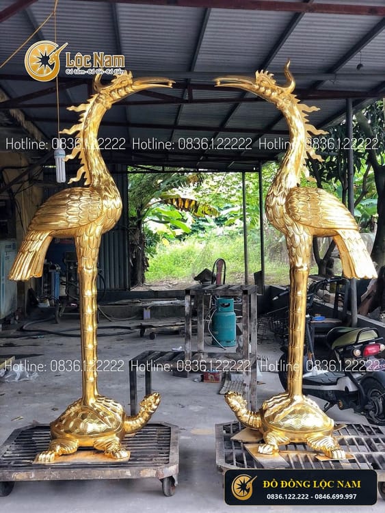 Hạc thờ bằng đồng đỏ dát vàng 9999 cao 2m1